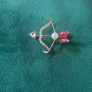 Elegant Gold and Pink Bow and Arrow Brooch